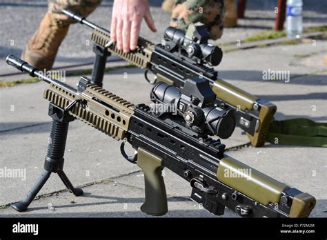 Two Sa80 A2 L85 Assault Rifles Sit On The Ground At Altcar Training