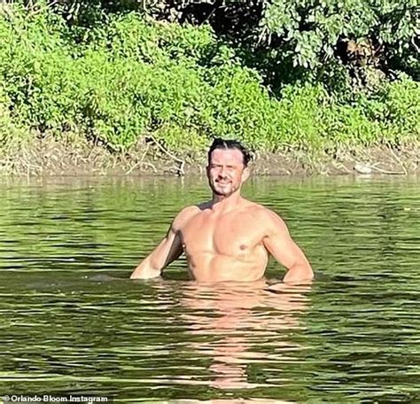 Katy Perry s fiancé Orlando Bloom swims NAKED and covers up his posterior with peach emoji