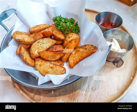 French fries with sauce Stock Photo - Alamy