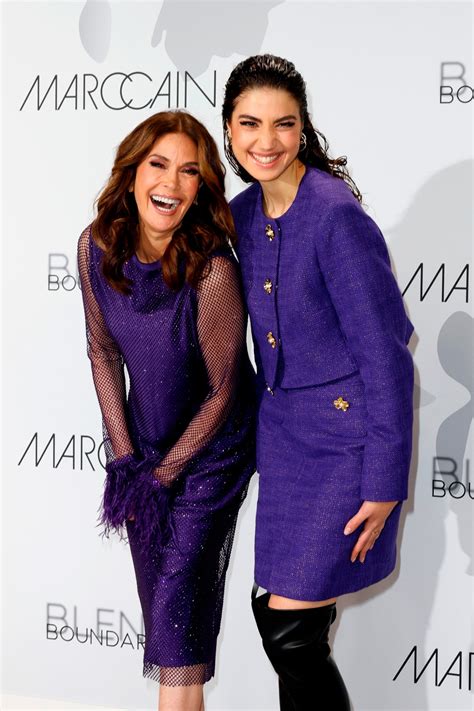 Teri Hatcher twins with daughter Emerson in purple at Berlin Fashion
