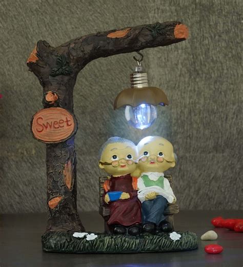 Buy Multi Romantic Couple With Led Light Polyresin Figurine At 38 Off By Tied Ribbons Pepperfry