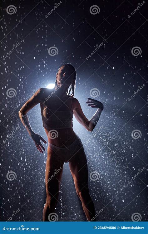 Seductive Caucasian Woman In Candid Lingerie Posing Under Rain Water Drops Stock Photo Image