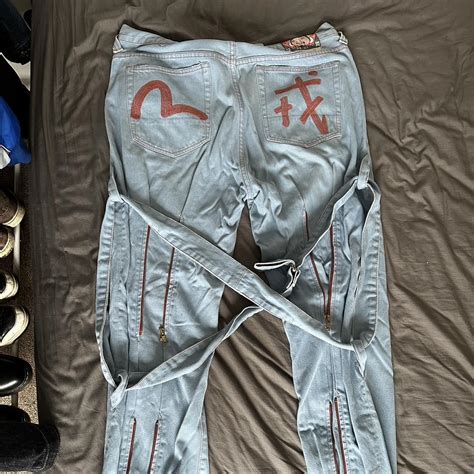 Evisu Men's Blue and Burgundy Jeans | Depop