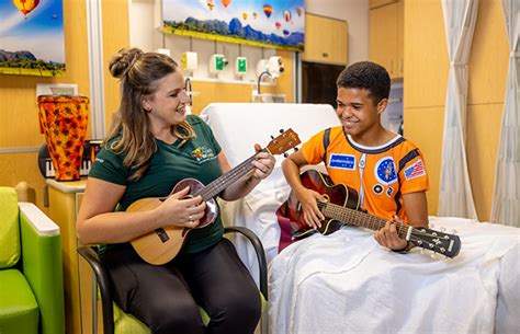 What Is Music Therapy And How Is It Used At Holtz Childrens Hospital