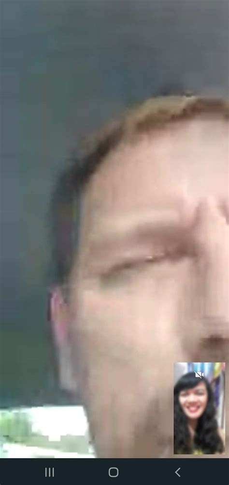 A Man With His Eyes Closed Is Seen Through The Camera S Screen Recorders