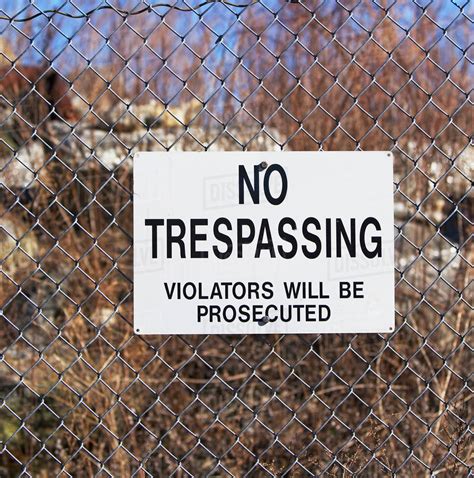 No Trespassing Sign On Fence Stock Photo Dissolve