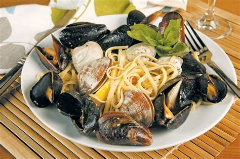 Clam And Mussel Linguine With Garnish On White Plate Prepared Food