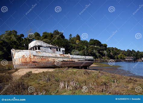 Old Abandoned Shipwreck On Port Stock Photo | CartoonDealer.com #130157526