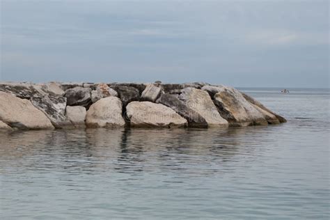 Rock Jetty By The Beach Under Blue Sky Stock Image Image Of Peaceful