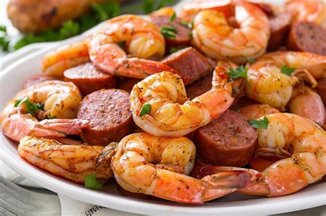 Premium Photo Hearty Cajun Seafood Meal With Cajun Shrimp And Sausage