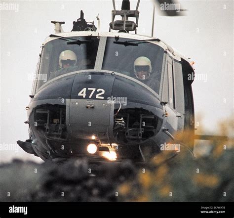 1977 - A front view of a UH-1 Iroquois helicopter waiting for orders to take-off during combat ...