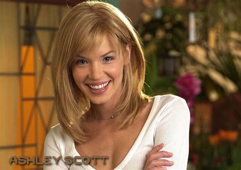 Download Stunning Ashley Scott Posing In A Green Outfit Wallpaper