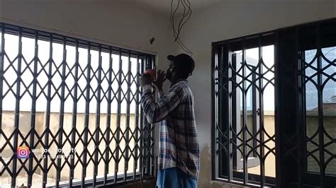 Replacing Fixed Burglar Proof With Collapsible Unit Building In Ghana Youtube