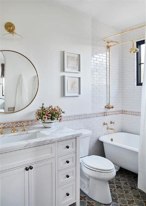 White Washstand With Pink Quatrefoil Tiles Transitional Bathroom