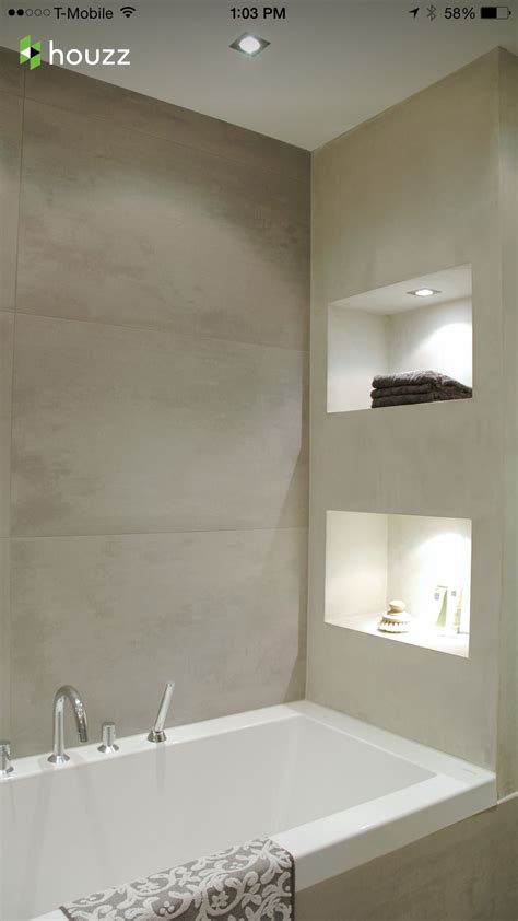 limestone walls  lit niches  deck mounted faucets bad inspiration bathroom design