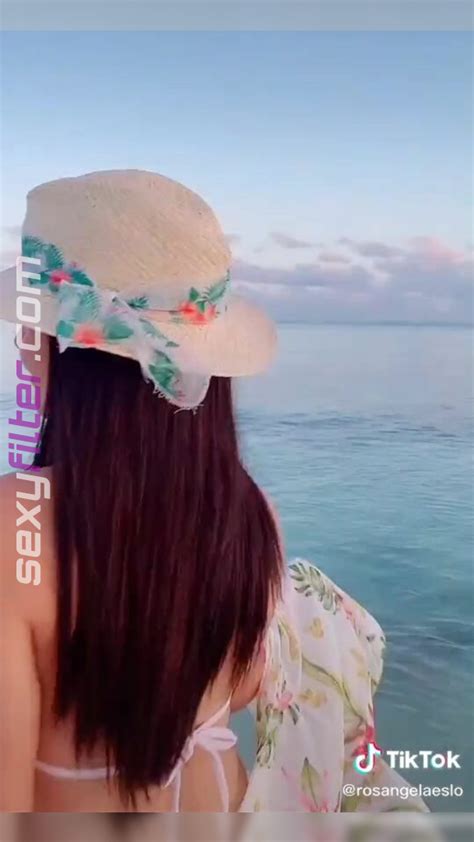 Elegant Rosángela Espinoza Shows Cleavage in White Bikini at the Beach sexyfilter