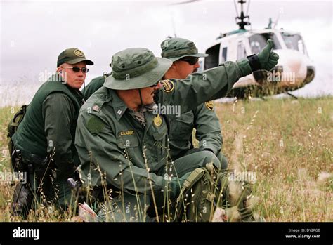 US Border Patrol officers during an operation near the border with Mexico June 1, 2006 near ...