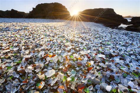 Glass beach at sunset, California, USA - Stock Image - C040/8010 - Science Photo Library