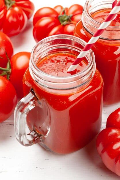 Premium Photo Fresh Tomato Juice And Ripe Tomatoes