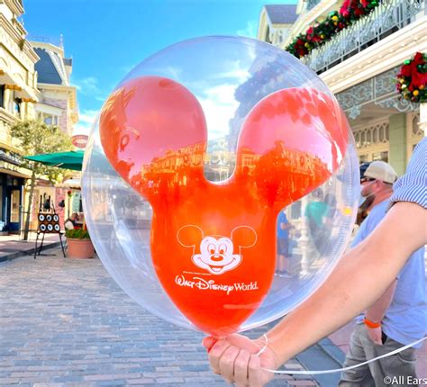 PHOTOS Orange And Golden Yellow Mickey Balloons Are Now Available In