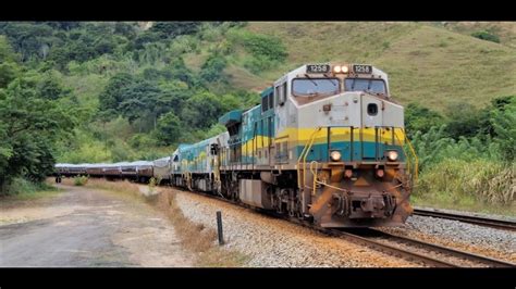 EFVM Cruzamento trem cargueiro e trem de minério carregado YouTube