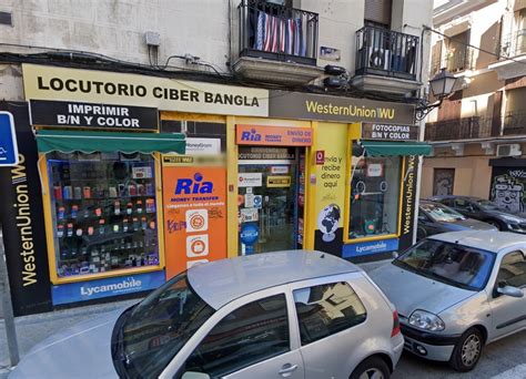 Tres Encapuchados Atracan A Punta De Pistola Un Locutorio En Madrid