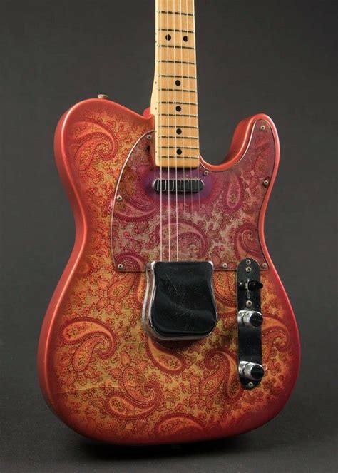 Red Fender Telecaster Guitar With Intricate Design