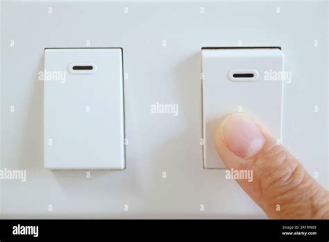 Finger Pushing A Switch For Turn Off Light Stock Photo Alamy