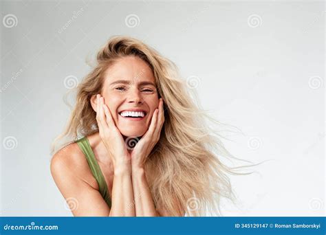 Photo Of Stunning Mature Blonde Female Laugh Touch Face Dressed Khaki Lingerie White Background