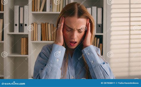 Caucasian Businesswoman With Laptop Suffer Headache Stressed