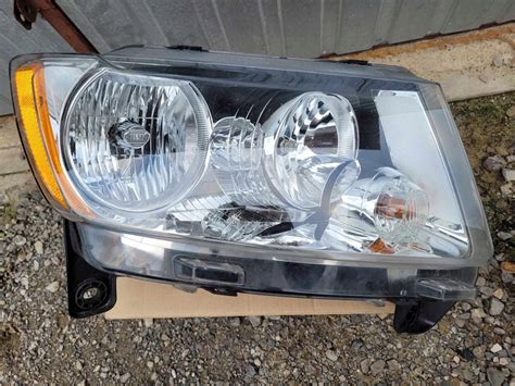 Lampa reflektor Jeep Grand Cherokee WK2 przód prawa 14688629477