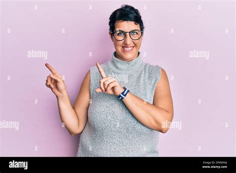 Plus Size Brunette Woman Wearing Casual Clothes And Glasses Smiling And