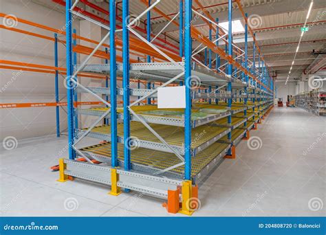 Gravity Flow Shelves stock photo. Image of logistics - 204808720