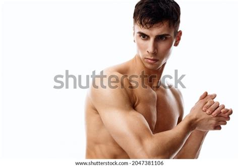 Nude Male Athlete Inflated Torso Gesturing Stock Photo