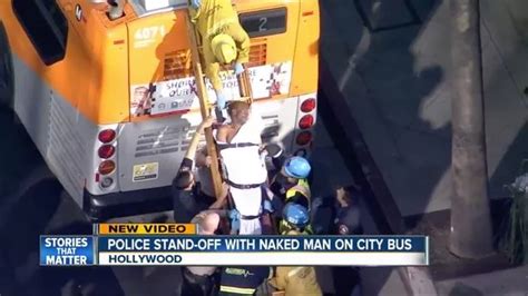 Naked Man Scales Bus And Struts On Roof While Blowing Kisses At Police Daily Record
