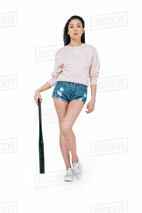 Beautiful Asian Girl Holding Baseball Bat And Looking At Camera