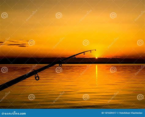 Fisherman Fishing Rod At Sunset Stock Image Image Of Landscape