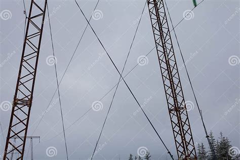 Electricity Transmission Power Lines On Winter Background High Voltage