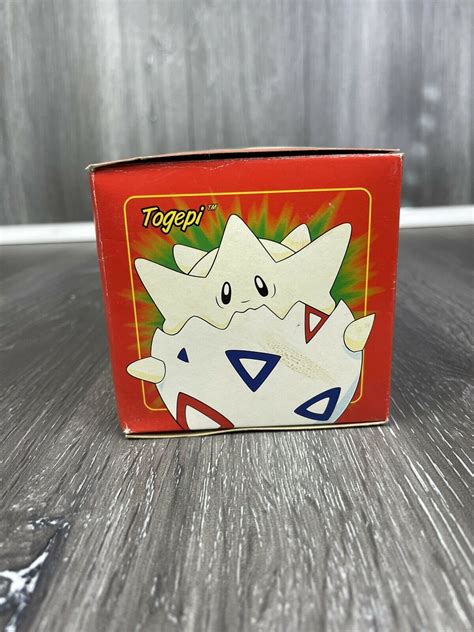 Mavin 1999 Pokemon 23k Gold Plated Trading Card Togepi Pokeball