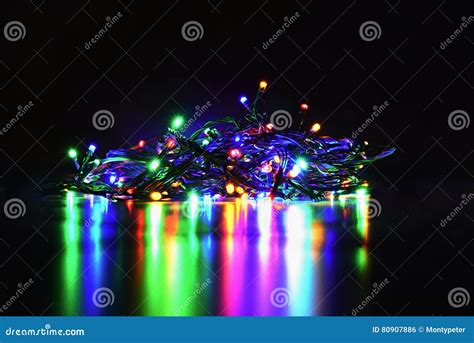 Christmas Lights On Black Background With Copy Space Colored