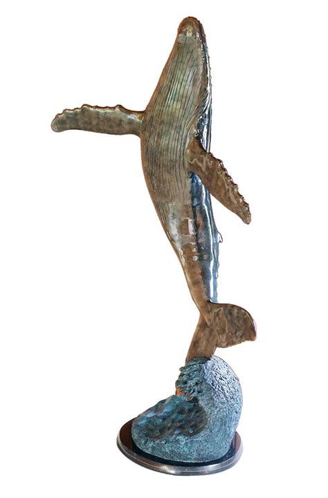 wyland breach   sky  bronze whale sculpture