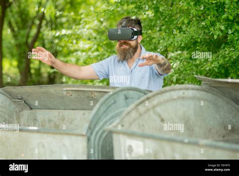 Bearded Man Wear Vr Glasses At Trash Dumpsters Man With Beard Explore