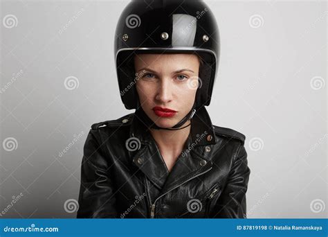 Closeup Portrait Of Biker Woman Over White Background Wearing Stylish