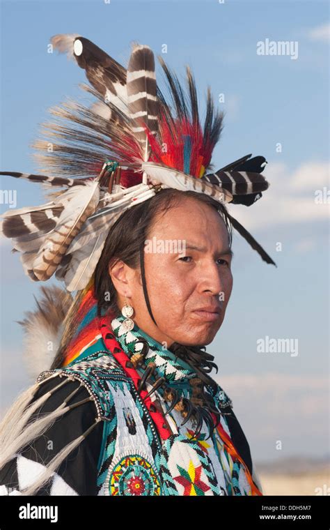 Native American Man Wearing Traditional Cheyenne Costume Outdoors Near