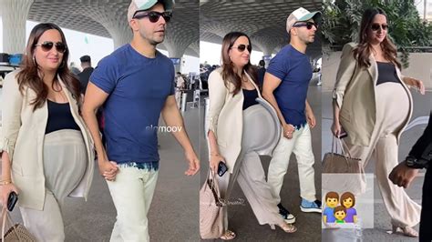 Pregnant Natasha Dalal Flaunts Her Baby Bump At The Airport With Her