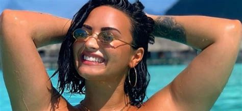 Demi Lovato In Cheeky Bikini Shows Stunning Body From A Pool