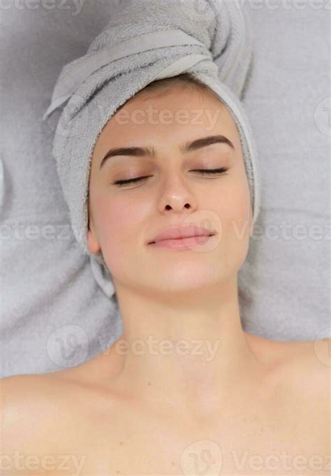 Beautiful Young Woman Receiving Facial Massage In Spa Salon Beauty