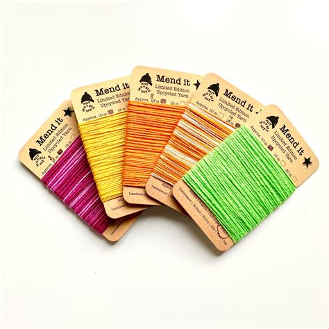 Five Spools Of Thread In Different Colors