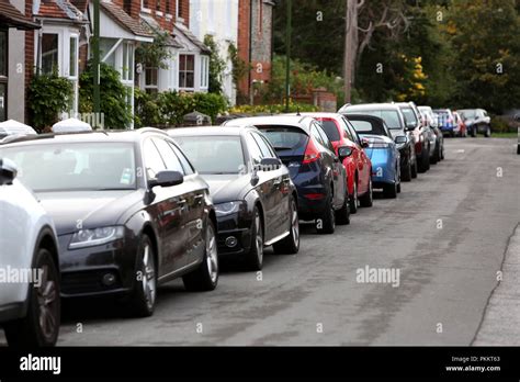 Busy Street With Cars Parked In Chichester West Sussex Uk Stock Photo