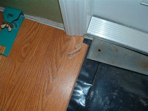 Installing Laminate Flooring Around Metal Door Frames Two Birds Home